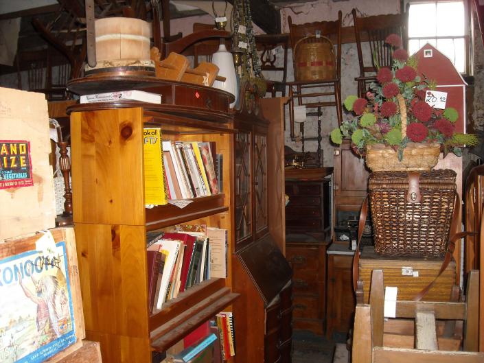 mid- century book shelves,wooden crates ,tables